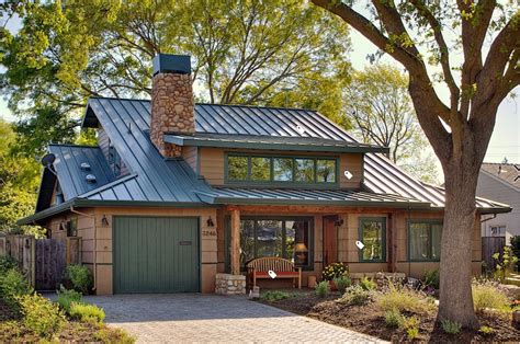 blue house with green metal roof|houses with blue shingle roofs.